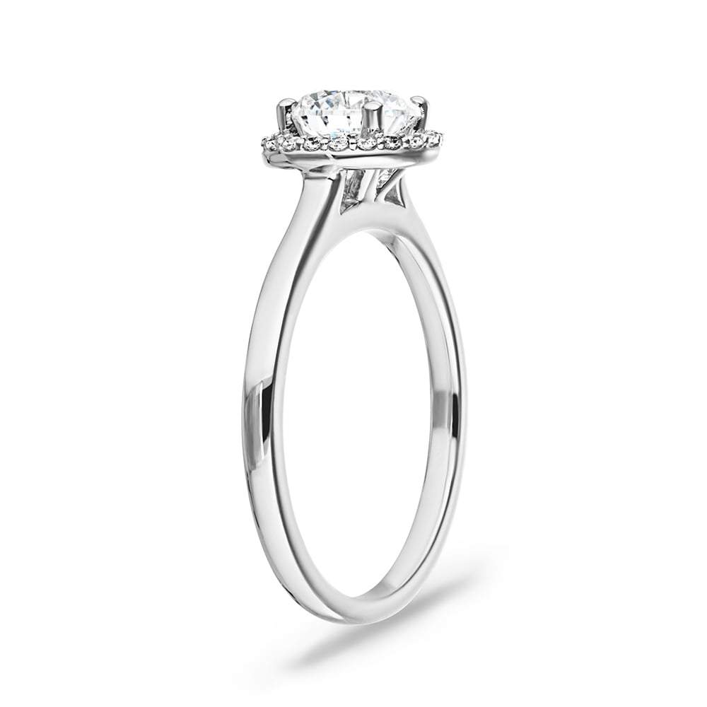 Shown with 1ct Round Cut Lab Grown Diamond in 14k White Gold|Beautiful stackable engagement ring with a diamond halo surrounding a 1ct round cut lab grown diamond in 14k white gold