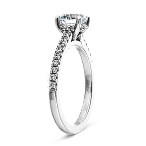 Hidden halo diamond accented engagement ring with 1ct round cut lab grown diamond in 14k white gold shown from side