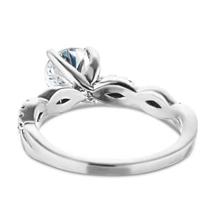 Nature inspired engagement ring with twisted diamond accented band featuring 1ct round cut lab grown diamond in 14k white gold shown from back