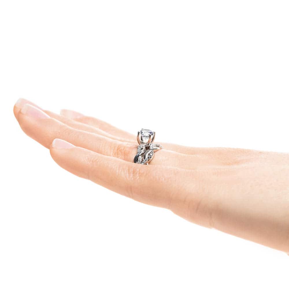 Matching Wedding Set shown with a 1.0ct round cut Lab-Grown Diamond with accenting stones in recycled 14K white gold 