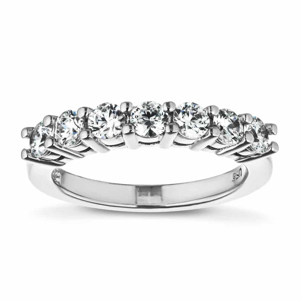 Shown with Round Cut Recycled Diamonds in 14k White Gold|Beautiful diamond wedding band with seven basket set round cut recycled diamonds in 14k white gold