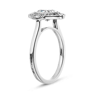 Antique style engagement ring with milgrain detail diamond accented halo in 14k white gold shown from side