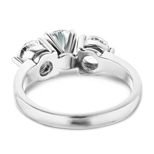 Three stone engagement with round cut lab grown diamonds in 14k white gold shown from back