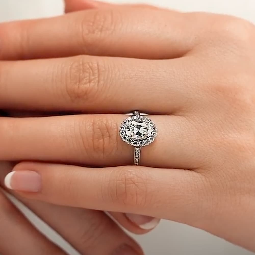 Shown with 1ct Oval Cut Lab Grown Diamond in 14k White Gold|Diamond accented halo engagement ring with 1ct oval cut lab created diamond in 14k white gold setting