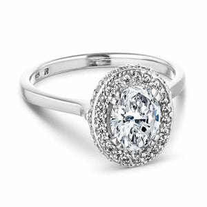 Antique style diamond accented halo engagement ring with 1ct oval cut lab grown diamond in 14k white gold