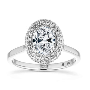 Beautiful vintage style diamond accented halo engagement ring with 1ct oval cut lab grown diamond in 14k white gold band with filigree and milgrain detailing