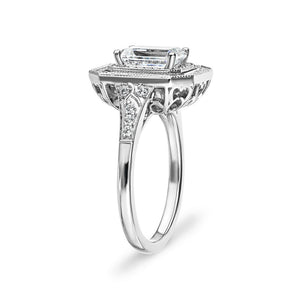 Antique style double halo engagement ring with 1ct emerald cut lab grown diamond in 14k white gold shown from side