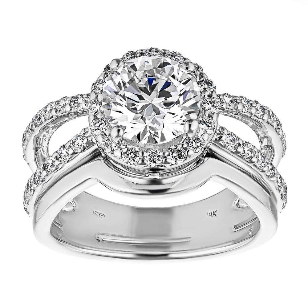 Shown with a 1.0ct Round cut Lab-Grown Diamond with diamond accented halo and split shank in recycled 14K white gold with matching wedding band| diamond accented engagement ring Shown with a 1.0ct Round cut Lab-Grown Diamond with diamond accented halo and split shank in recycled 14K white gold with matching wedding band