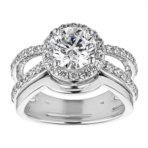  diamond accented engagement ring Shown with a 1.0ct Round cut Lab-Grown Diamond with diamond accented halo and split shank in recycled 14K white gold with matching wedding band
