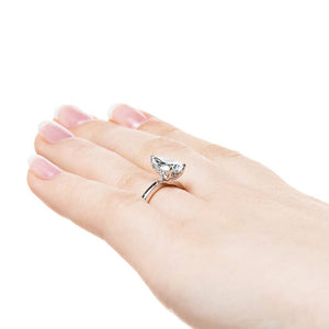 Hidden halo engagement ring with 1ct pear cut lab grown diamond in 14k white gold band