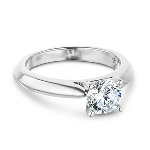 Simple solitaire engagement ring with cathedral design holding a 1ct round cut lab grown diamond in 14k white gold