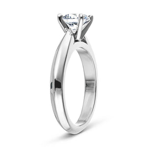 Simple solitaire engagement ring with cathedral design holding a 1ct round cut lab grown diamond in 14k white gold shown from side
