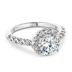 Unique twisted diamond halo engagement ring with a 1ct round cut lab grown diamond in a braided design 14k white gold metal band