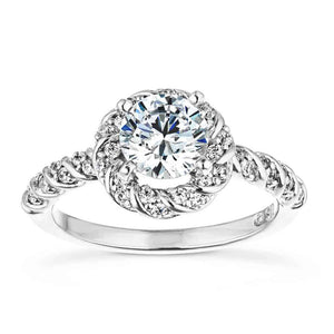 Unique twisted diamond halo engagement ring with a 1ct round cut lab grown diamond in a braided rope design 14k white gold band