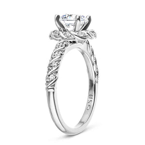 Nature inspired twisted diamond halo engagement ring with a 1ct round cut lab grown diamond in 14k white gold shown from side