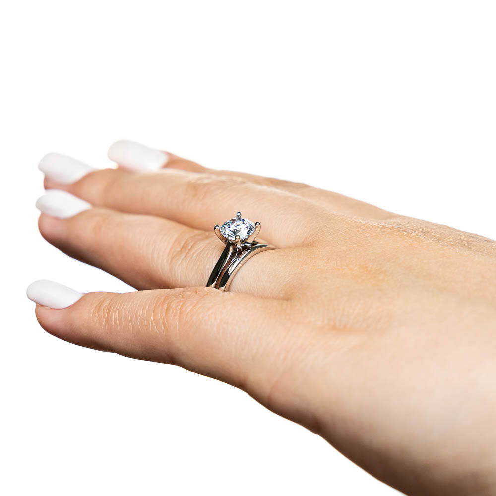 Shown with a 1.0ct Round cut Lab-Grown Diamond in recycled 14K white gold with matching wedding band 