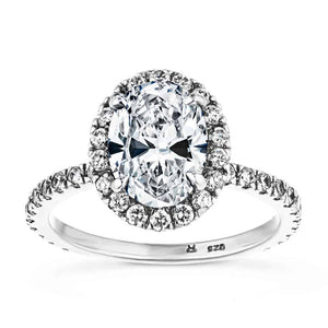 Dream diamond halo engagement ring with diamond accents and a 1ct oval cut lab created diamond in platinum