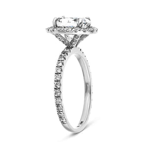 Dream diamond halo engagement ring with diamond accents and a 1ct oval cut lab grown diamond in platinum shown from side