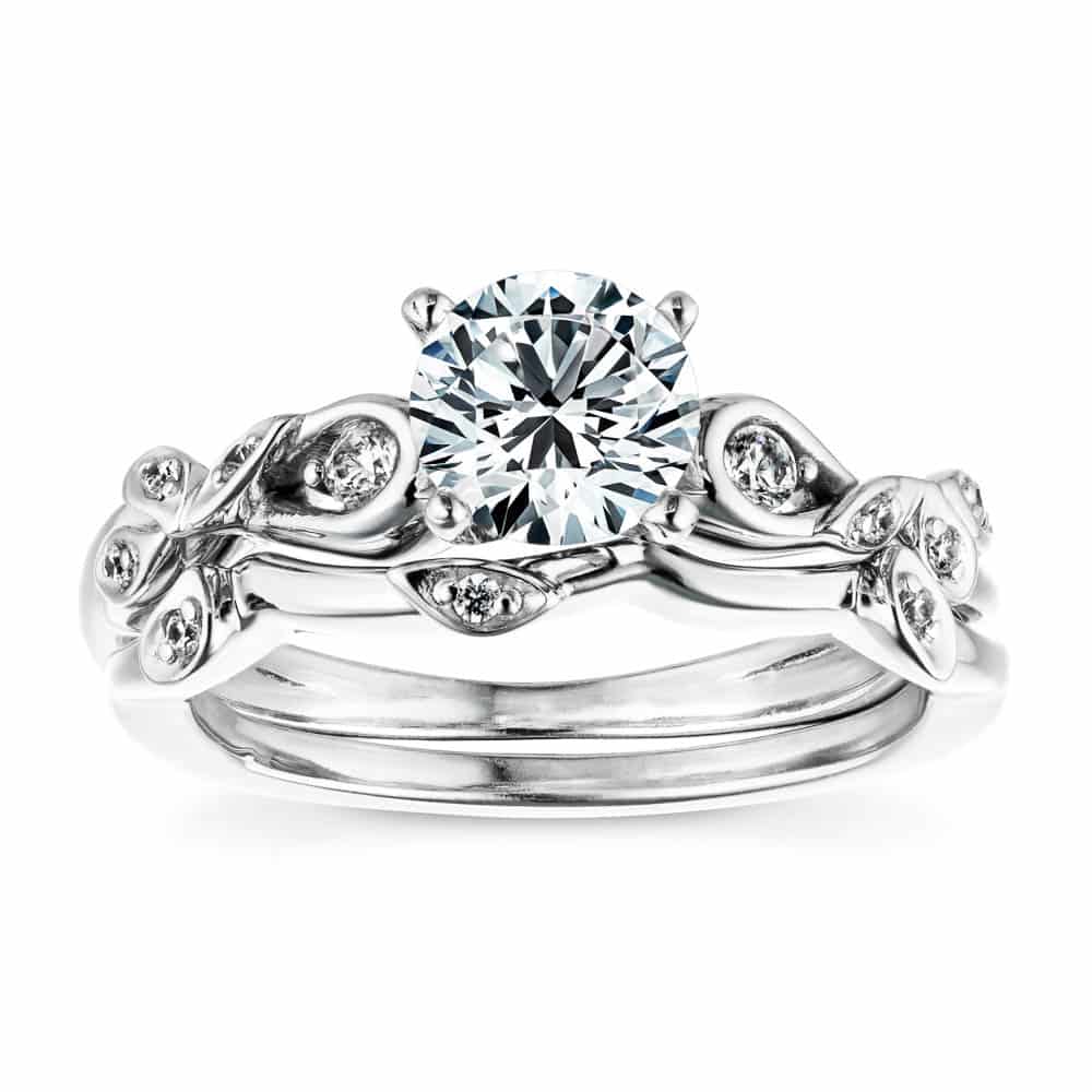 Shown with a 1.0ct Round cut Lab-Grown Diamond with accenting diamonds in recycled 14K white gold with matching wedding band | engagement ring leaf detail Shown with a 1.0ct Round cut Lab-Grown Diamond with accenting diamonds in recycled 14K white gold with matching band