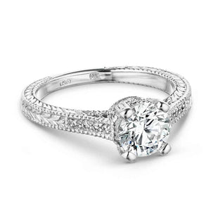  antique style engagement ring Shown with a 1.25ct Round cut Lab-Grown Diamond with filigree detail and accenting diamonds on the band in recycled 14K white gold