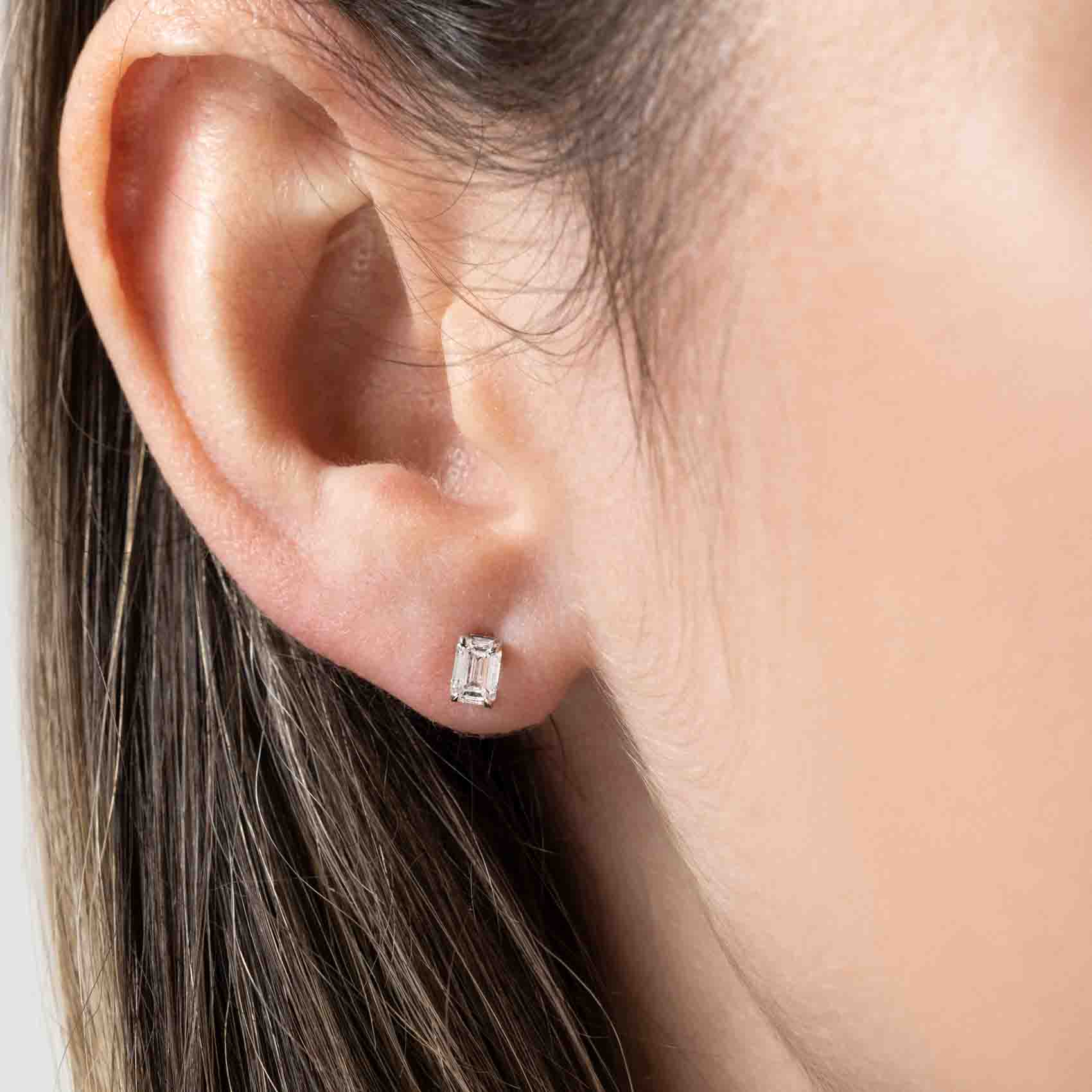 Emerald Cut Lab Grown Diamond Basket Stud Earrings Shown in 14K White Gold| emerald cut basket stud earrings with lab grown diamonds set in 14k white gold metal