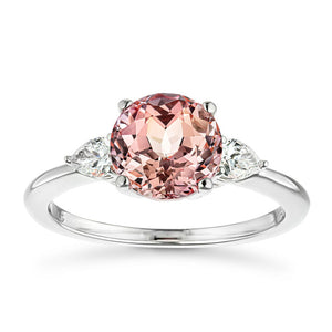 Ethical three stone engagement ring with 2ct lab created champagne pink sapphire center stone and pear diamond side stones in 14k white gold