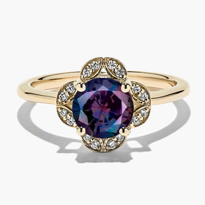 diamond accented halo engagement ring with Alexandrite lab created gemstone in 14k yellow gold