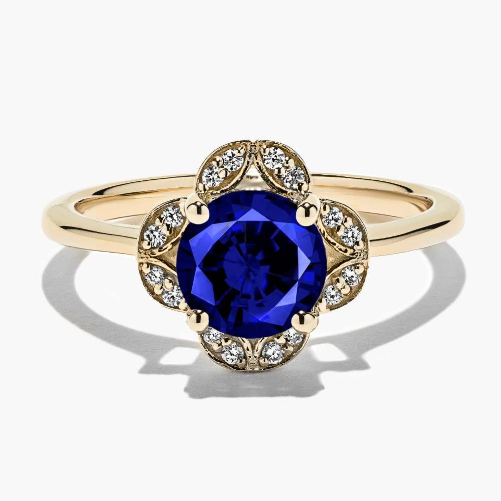 Shown here with a Round Cut Lab Created Blue Sapphire in 14K Yellow Gold