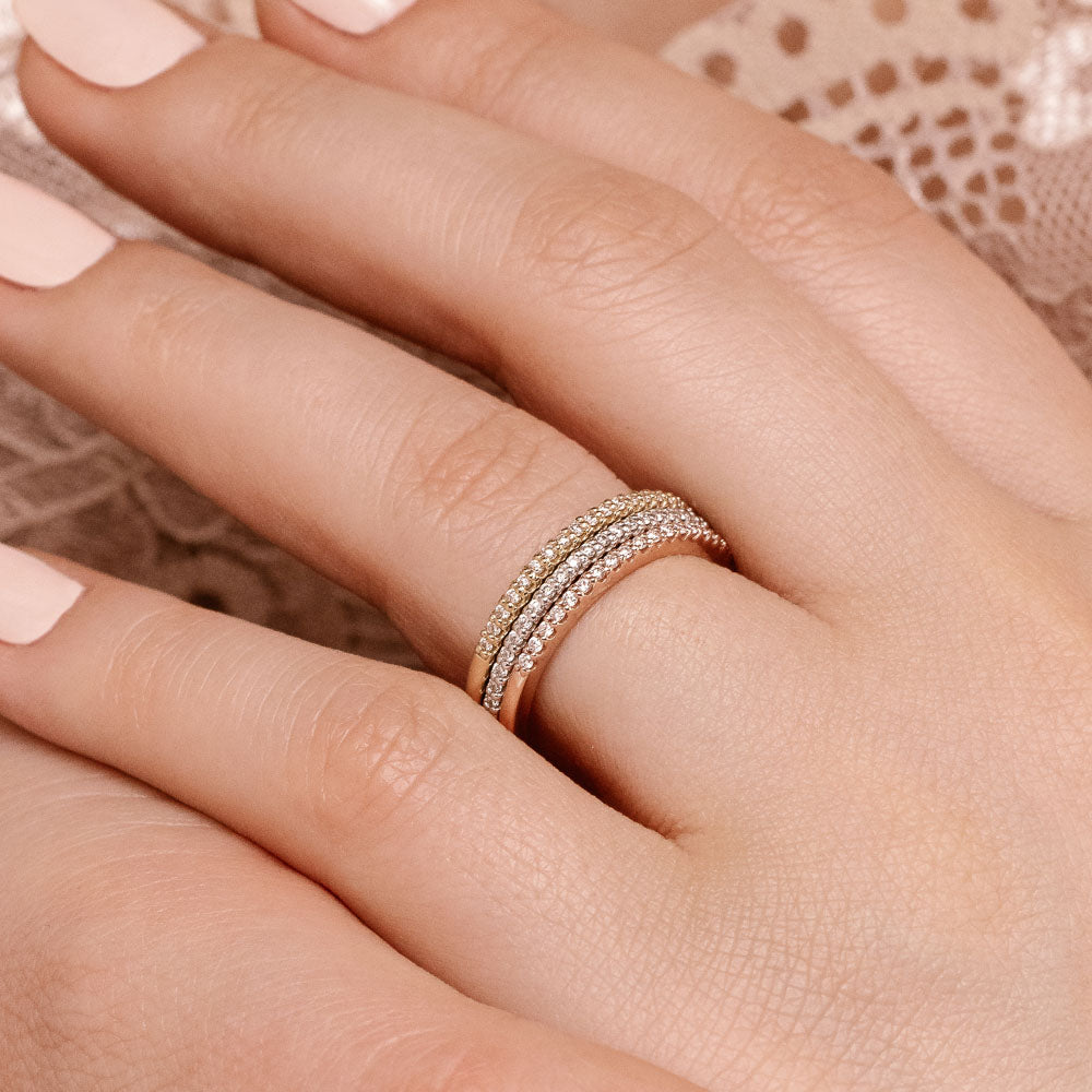 Stackable single band with 0.13ctw lab-grown diamonds in your choice of 10K Rose Gold, 10K Yellow Gold, and 10K White Gold or purchase all three at a discount. 
