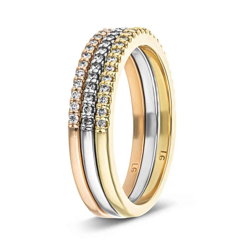 Diamond accented band in 10K yellow, rose and white gold 
