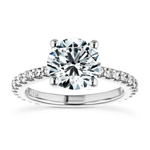 Ethical pave set diamond accented engagement ring with 1.5ct round cut lab grown diamond in platinum setting