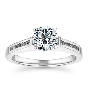 Modern channel set diamond accented engagement ring with 1ct round cut lab grown diamond  set in platinum