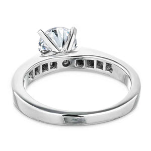 Modern channel set diamond engagement ring in white gold shown from back