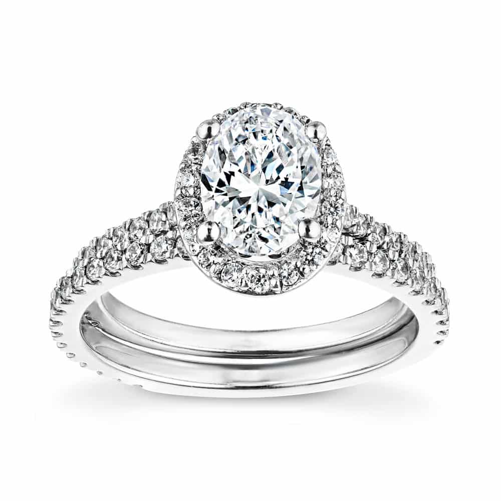 Shown with a 1.5ct oval cut Lab-Grown Diamond in recycled 14K white gold with matching wedding band 