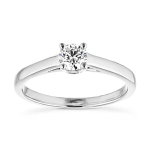 Traditional solitaire engagement ring with 4 prong basket set round cut lab grown diamond in 14k white gold