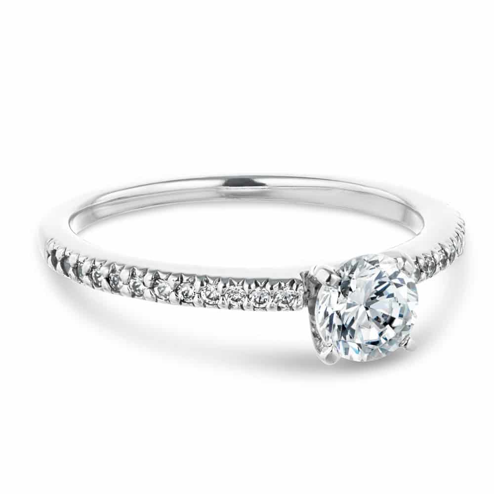 Shown with 0.70ct Round Cut Lab Grown Diamond in 14k White Gold|Classic diamond accented solitaire engagement ring with 4 prong set round cut lab grown diamond in 14k white gold