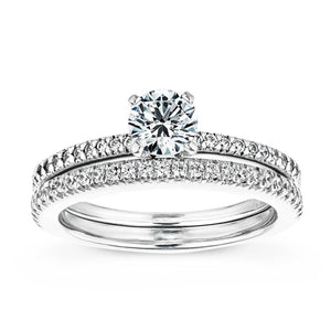  accented diamond wedding set Shown with a 1.0ct Round cut Lab-Grown Diamond with a diamond accented band in recycled 14K white gold with matching wedding band