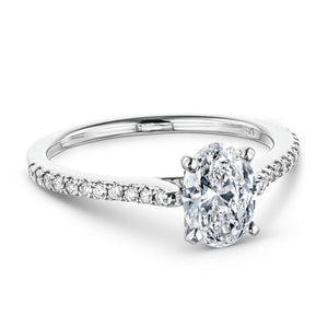 Timeless diamond accented engagement ring with 1ct oval cut lab grown diamond in 14k white gold