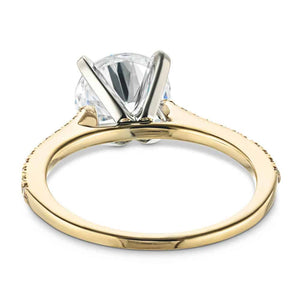 Stackable diamond accented engagement ring with 1.5ct round cut lab grown diamond in 14k yellow gold shown from back