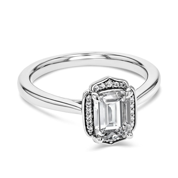 Shown here with a 1.0ct Emerald Cut center stone in 14K White Gold|halo engagement ring with 1 carat emerald cut center stone set in 14k white gold metal