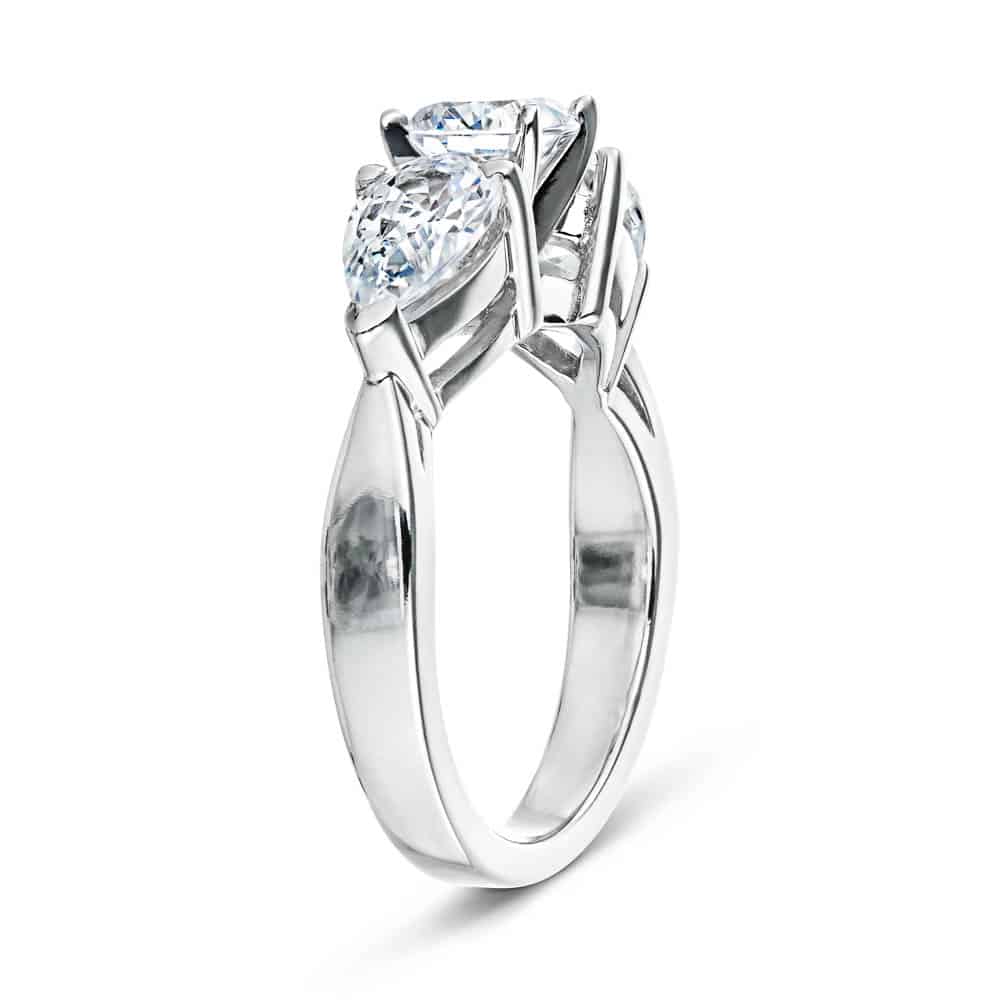 Shown with Three Pear Cut Lab Grown Diamonds in 14k White Gold. Center: 1.25ct, Side Stones: 0.75ct|Unique three stone teardrop engagement ring with 1.25ct and 0.75ct lab grown diamonds set in 14k white gold