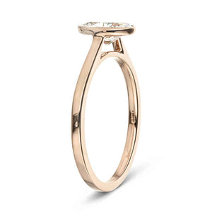 Minimalistic sleek modern flat design stackable engagement ring with 1ct bezel set oval cut lab grown diamond in 14k rose gold