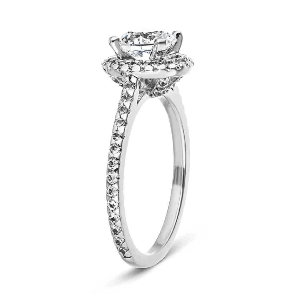 Shown with 1ct Round Cut Lab Grown Diamond in 14k White Gold|Unique diamond accented halo engagement ring with 1ct round cut lab grown diamond in 14k white gold