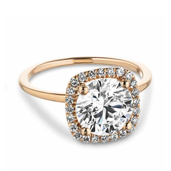 Shown with 2ct Round Cut Lab Grown Diamonds in 14k Rose Gold|Beautiful rose gold engagement ring with 2ct round cut lab grown diamond surrounded by a diamond halo in solid 14k gold