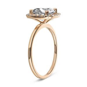 Stunning diamond halo engagement ring with 2ct round cut lab grown diamond in 14k rose gold shown from side