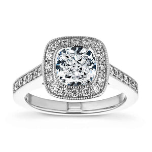 Vintage style diamond accented halo engagement ring with 1.5ct cushion cut lab grown diamond in milgrain detailed 14k white gold setting