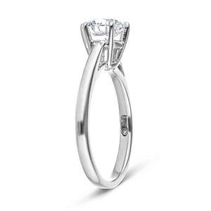 Crown style solitaire engagement ring with 6 prong set 1ct round cut lab grown diamond in 14k white gold shown from side