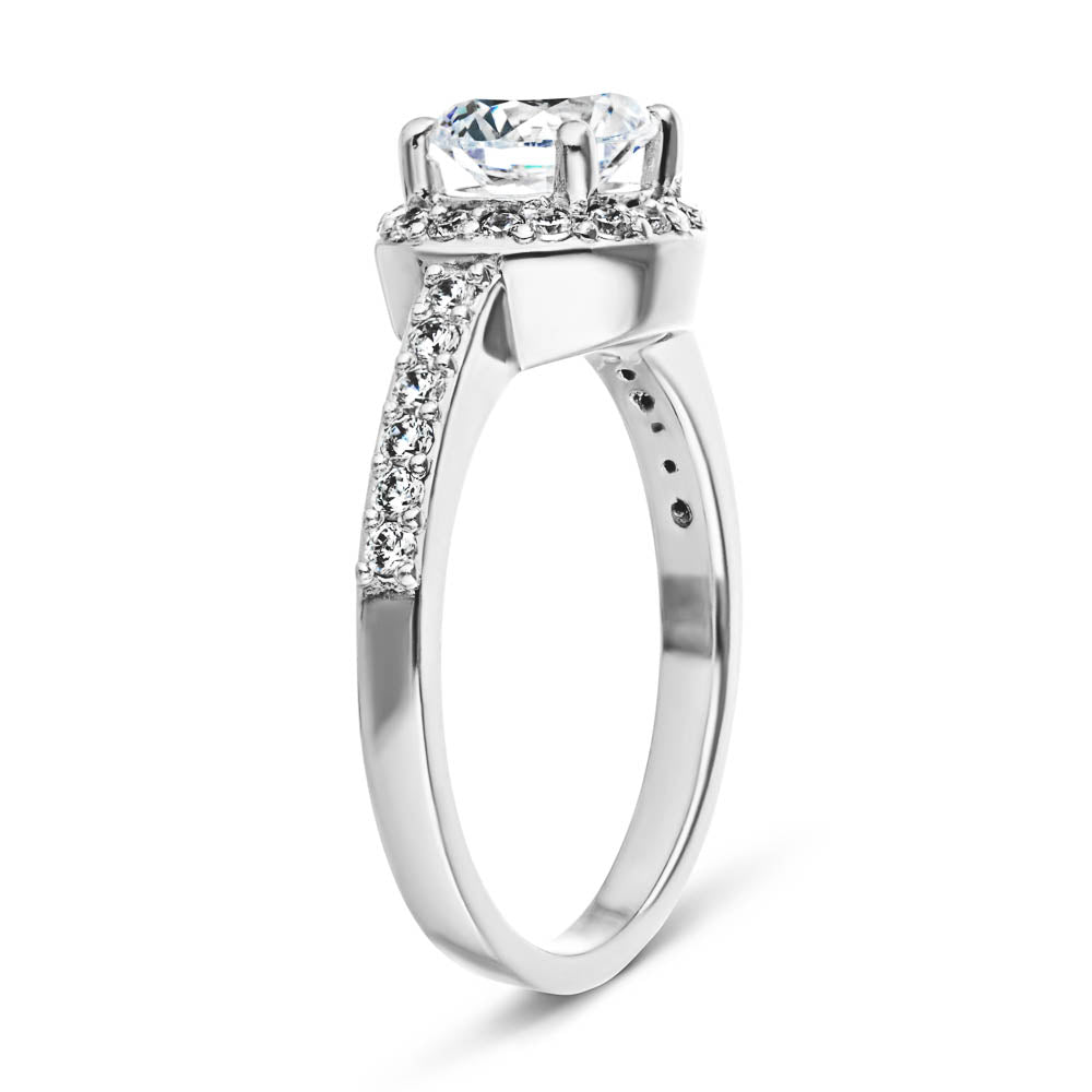 Shown with 0.5ct Round Cut Lab Grown Diamond in 14k White Gold|Unique channel set diamond accented halo engagement ring with 0.5ct round cut lab grown diamond in 14k white gold