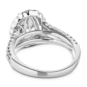 Flower halo engagement ring with diamond accented split shank holding a 1ct oval cut lab grown diamond in 14k white gold shown from back