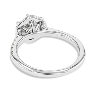 diamond accented halo engagement ring with lab grown diamond center stone set in 14k white gold recycled metal